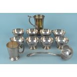 A selection of silver plated items including eight punch cups with ladle and two tankards