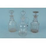 A pair of William IV decanters and a Victorian claret jug