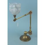 An early 20th Century adjustable brass table lamp,
