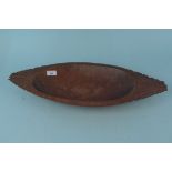 A vintage Trobriand Islands hand carved tribal shallow dish,