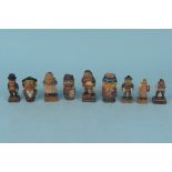 A small collection of Bavarian carved wooden figures,