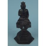An antique bronze seated Buddha figure,