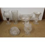 Six pieces of cut glass tableware including bowls and covers,