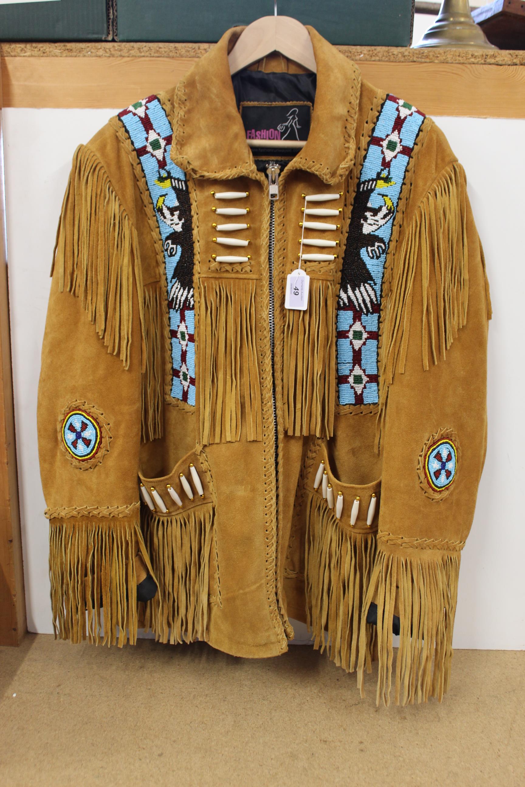 A Native American style suede fringed jacket with bead work decoration,