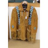 A Native American style suede fringed jacket with bead work decoration,
