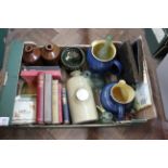 A mixed box of items including two Denby jugs, vintage bottles, stoneware foot warmer,