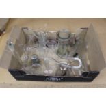A box of various vintage glass chemistry accessories