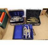 Two cased cornets by Besson, London plus one other by Lark,