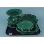 Thirteen assorted 19th Century green 'cabbage' plates, two dishes and two comports,
