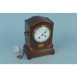An Edwardian inlaid case chiming mantel clock with pendulum and key,