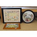 Three needlework pictures including a sampler,