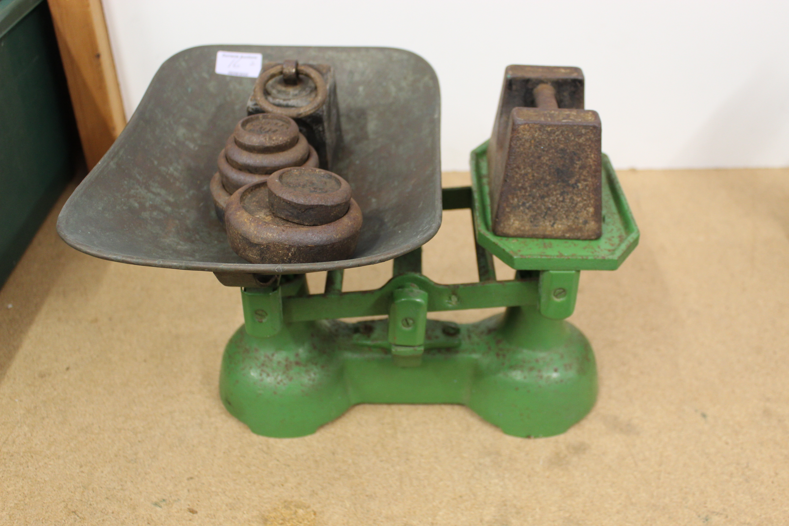 A set of 1920's grocery scales with a copper pan and assorted weights plus four oil lamps - Image 3 of 3