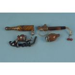Two vintage Austrian Tyrolean pipes and gimmick bottle pipe (one as found spout)
