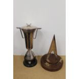 Two imposing go kart trophies,