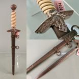 A very rare double engraved blade second model (1937) Luftwaffe Officer's dress dagger with white