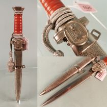 A German Red Cross (Deutsches Rotes Kreuz) leaders dagger with portepee and a set of rare correct