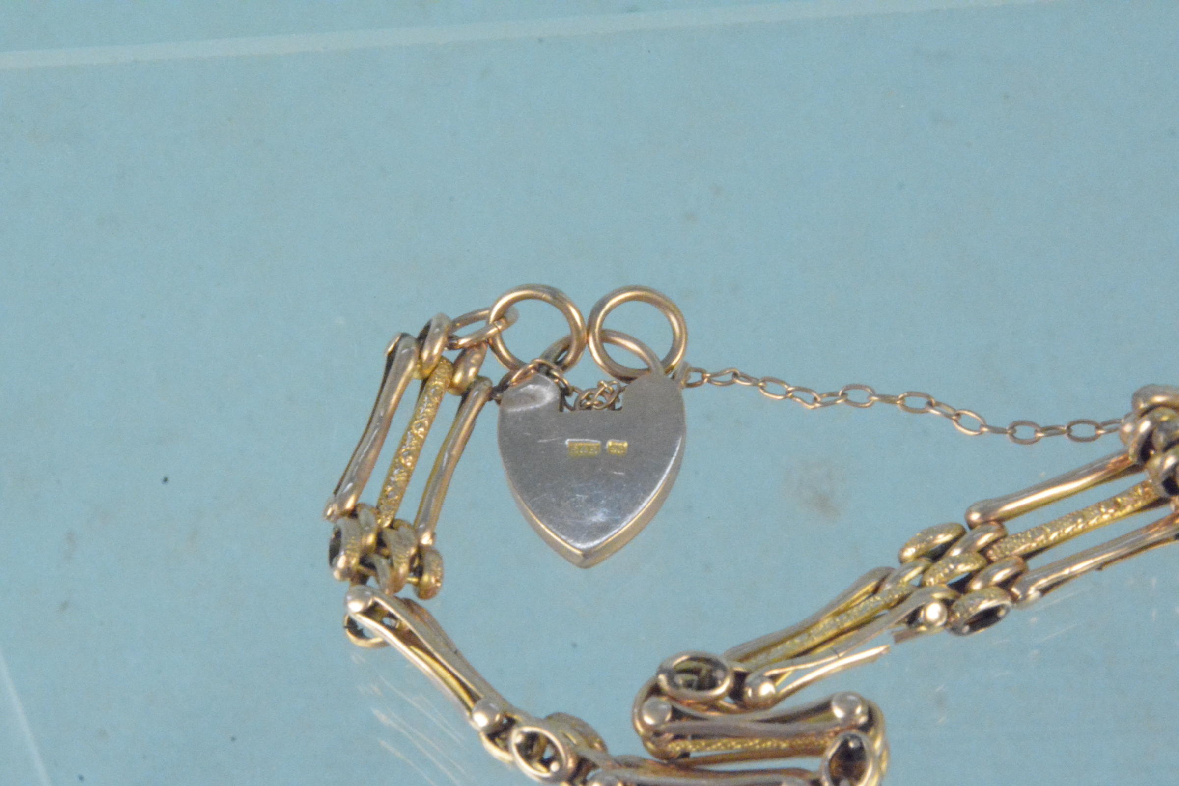 A yellow metal gate link bracelet with 9ct gold padlock clasp, - Image 3 of 3