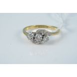 An 18ct platinum set three stone diamond ring, size M 1/2, weight approx 3.