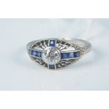 An Art Deco style platinum diamond and sapphire set ring,