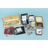 A quantity of costume jewellery including necklaces and brooches,