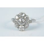 A platinum diamond cluster ring,