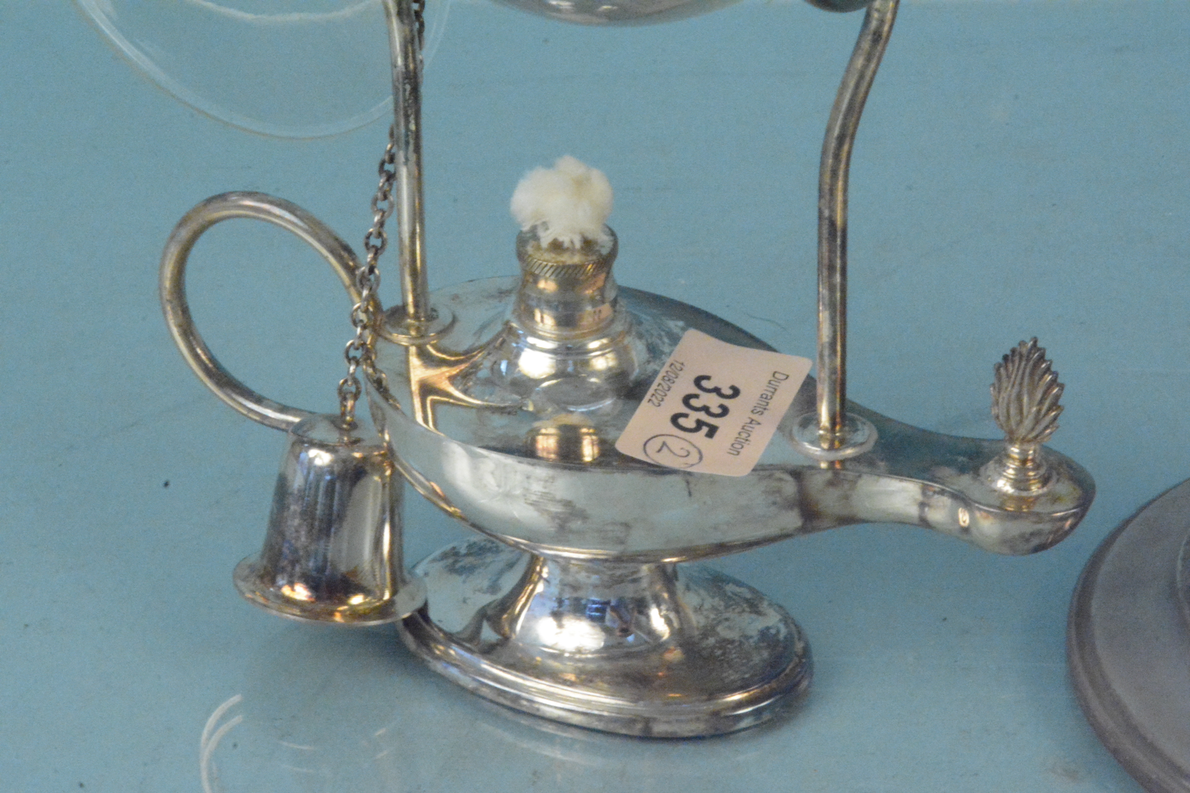 A silver plated brandy warmer in the form of Aladdins lamp plus a white metal lamp with glass - Image 2 of 3