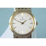 A ladies Bulova C935159 gold plated quartz wristwatch