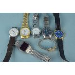 Seven assorted vintage and modern wristwatches including a Seiko 5 stainless steel watch