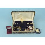 A collection of silver and costume jewellery including earrings, brooches,