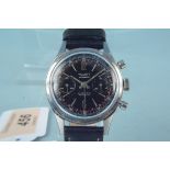 A c1960's gloss black dialled chronograph wristwatch, dial marked 'Tillett, Norwich',