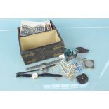 A leather clad chest form trinket box with contents including a 9ct gold ladies wristwatch,