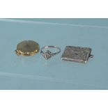 A 9ct gold back and front locket set with small diamond,