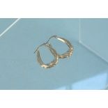 A pair of 9ct gold hoop earrings,