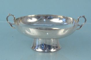 A silver twin handled bowl on large flared pedestal base, hallmarked Sheffield 1924,
