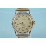 A 9ct gold Thomas Russell & Sons 1950's wristwatch with rolled gold expanding bracelet