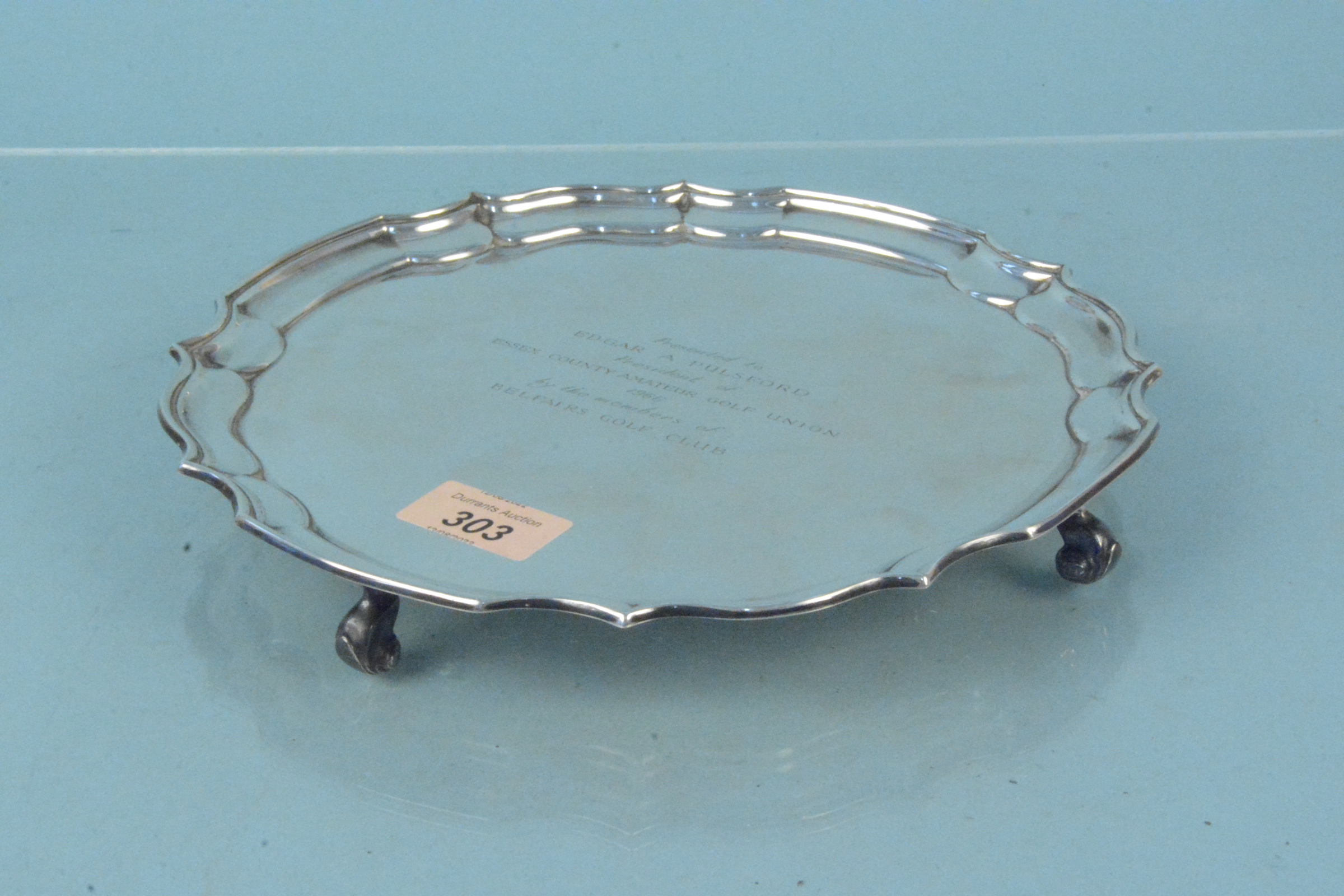 A shaped silver salver with presentation inscription on four feet (one bent), - Image 3 of 4