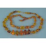 Two amber type necklaces
