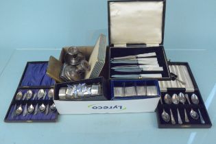 A quantity of silver and silver plated items including squat candlesticks, silver spoon,
