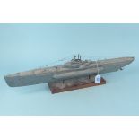 A vintage wooden model of U-boat 804 submarine,