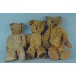 Three vintage mohair Teddy bears, all unmarked, one with interior bell,