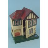 A small hand painted and decorated vintage dolls house, 41.