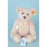 A Steiff mohair 'rose pink' bear with button and labels