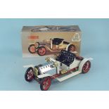 A boxed vintage Mamod steam roadster with accessories,