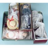Five assorted boxed dolls, assorted stands included,