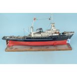 A large wooden model, probably Billing Boats, of the tug boat 'Zwarte-Zee',