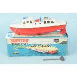 A boxed Jupiter Ocean Pilot clockwork boat by Sutcliffe Models, with key,
