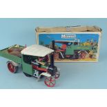 A boxed Mamod steam wagon with accessories,