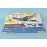 Two boxed models Cessna 180 (opened and disturbed contents,