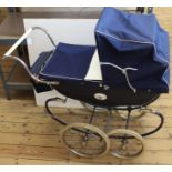 A vintage 1960's Marmet dolls pram with doll (very clean condition)
