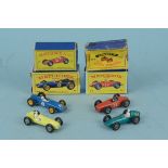 Four boxed Matchbox Series racing cars including a yellow No.